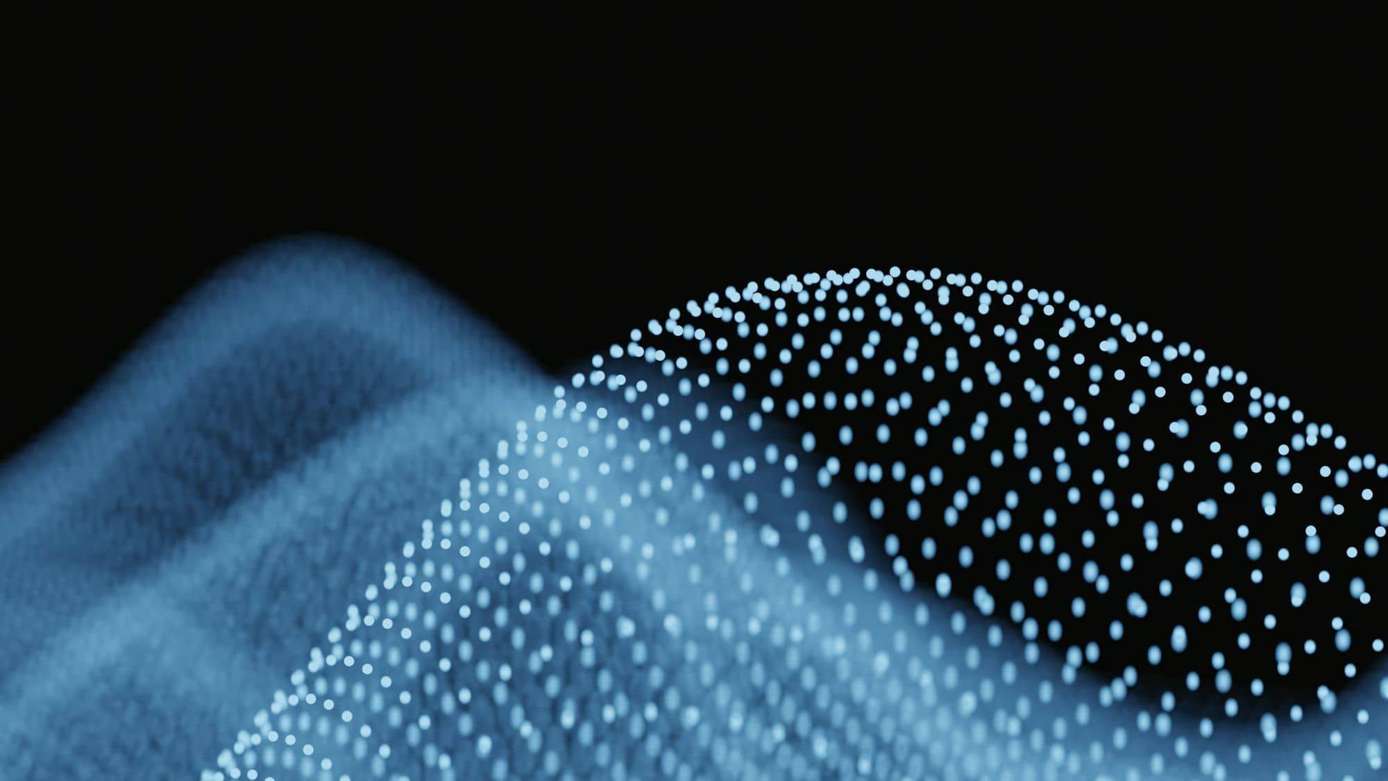 Abstract waves of glowing blue data points.